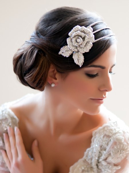 Updo with a side tiara with a rose and crystals