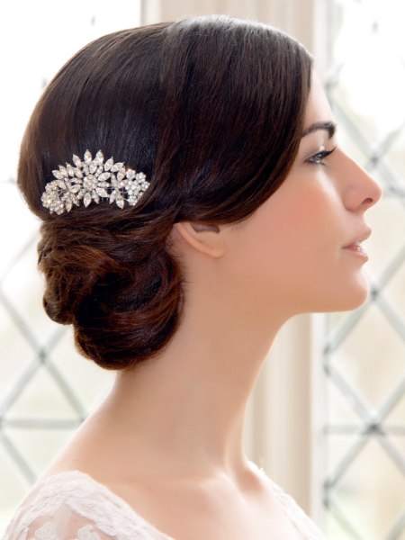 Woven updo and a 1940s inspired hair comb with crystals