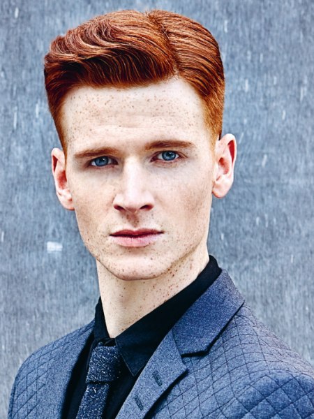Men's hair with molded styling and a wave