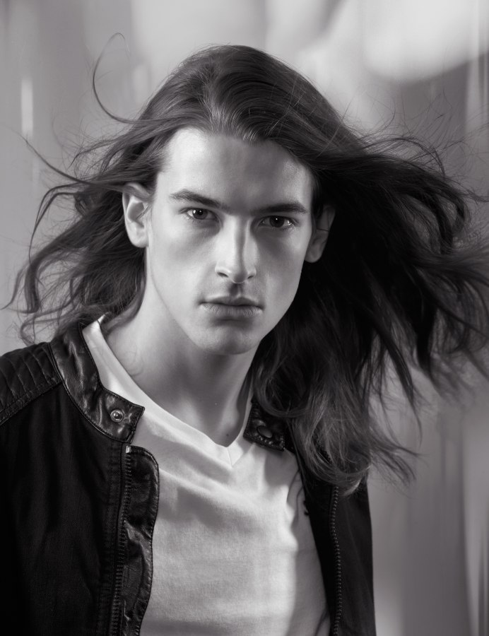 Well groomed and long flowing hair for men