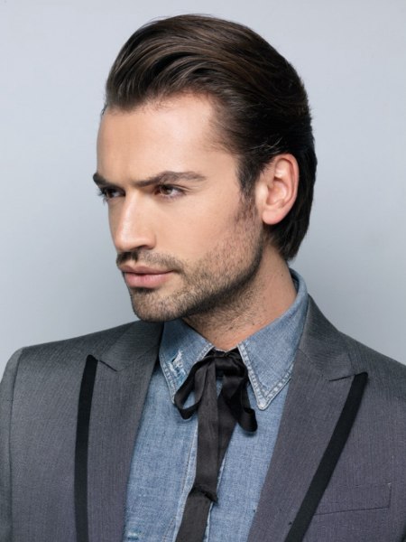 Styled back look for men with longer hair