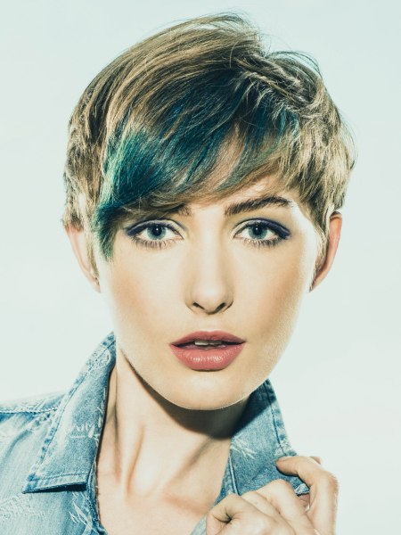 Pixie with blue streaks in the fringe