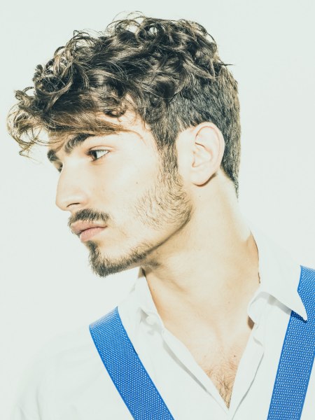 Men's hair with clipped sides and curls