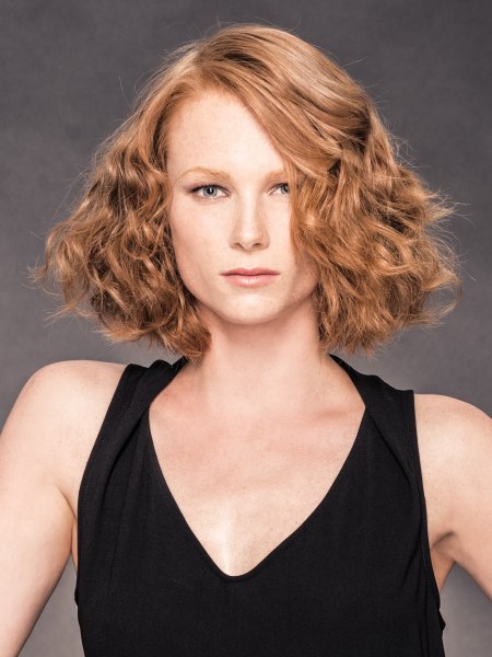 Wavy bob haircut with a side part