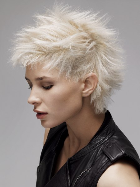 Short platinum blonde hair with spikes