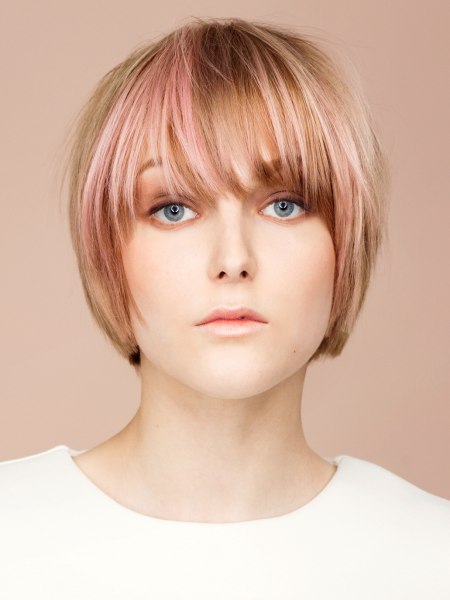 Bob cut for blonde hair with pink accents