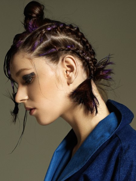Hair with multiple braids, a bun, and purple color accents