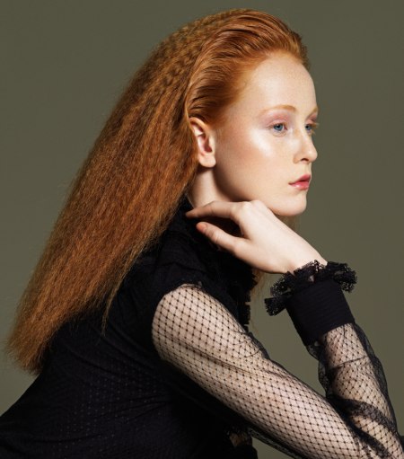 Long, crimped red hair