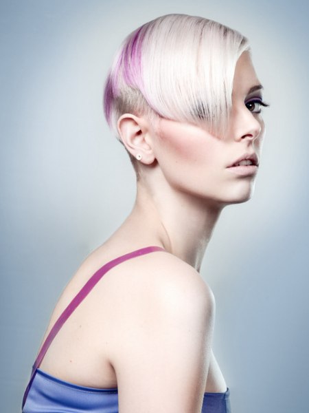 Pixie cut with a long fringe that overhangs an undercut