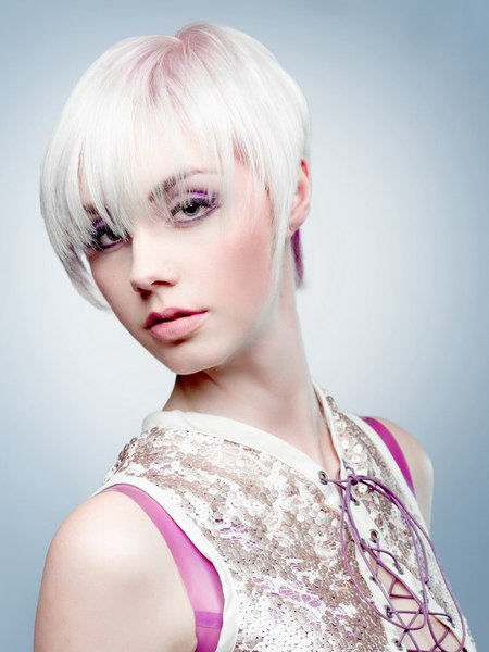 Blonde pixie cut with a rose underbody