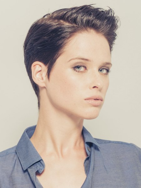 Sleek pixie cut with gel styling