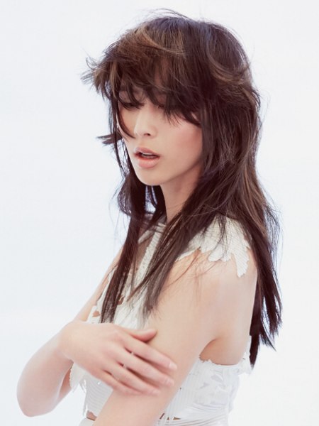 Hair with a long fringe curled sideways