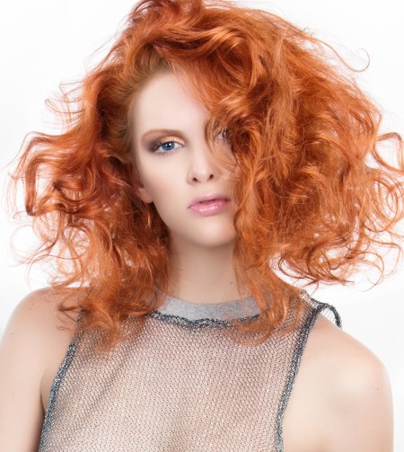 Curly red hair with a trapeze shape