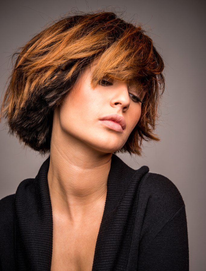 Choppy bob cut with a long fringe Choppy bob cut with a long fringe