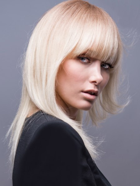 Straight blonde hair with a fringe