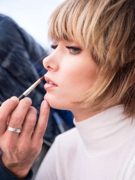 Layered hair with thick bangs