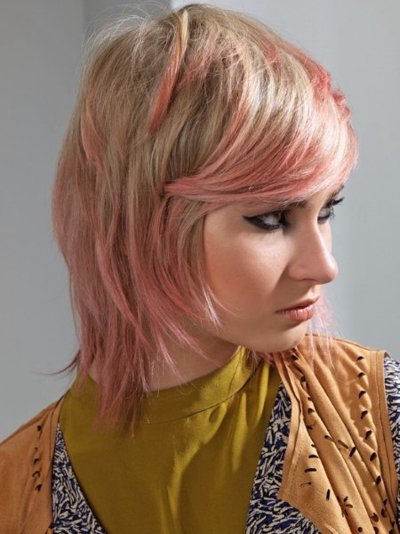 Blonde hair with pastel pink accents