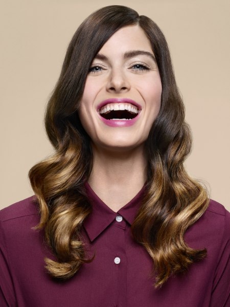 Long hair with wavy curls and a crisp buttoned-up blouse collar