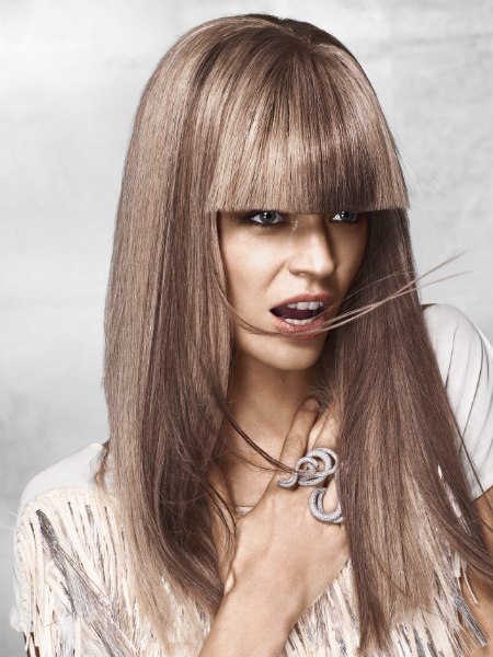 Long straight hairstyle with thick one-length bangs