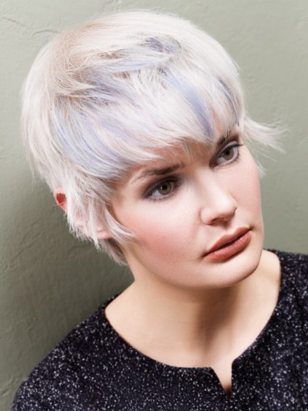Pixie cut with feathery sections in front of the ears