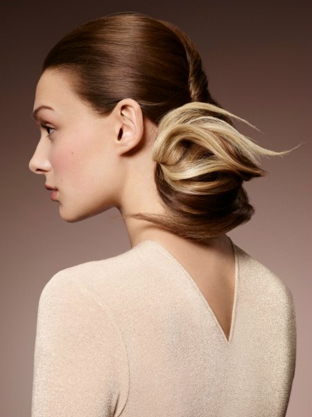 Preppy updo with a low neck chignon