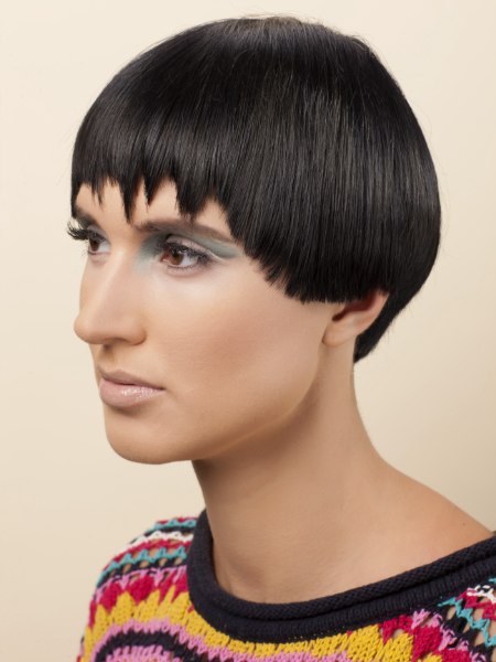 Smooth short haircut with the ears half covered