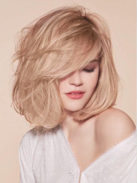 Long blonde bob with volume