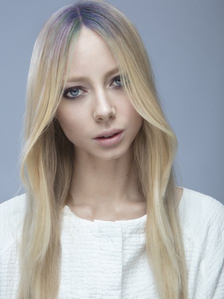 Blonde hair with pastel colors in the roots area