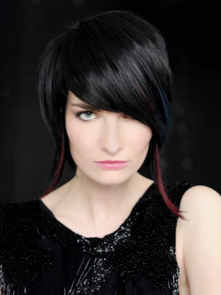 Hair colored with a mix of black, gray, blue and red