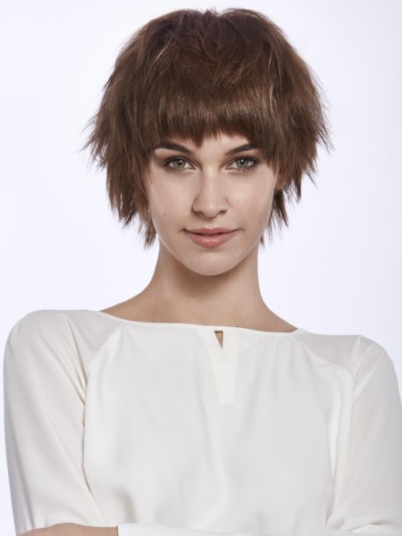 Short layered haircut with frayed bangs