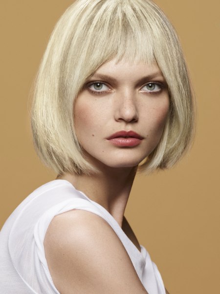 Short bob with razor thinning and short bangs