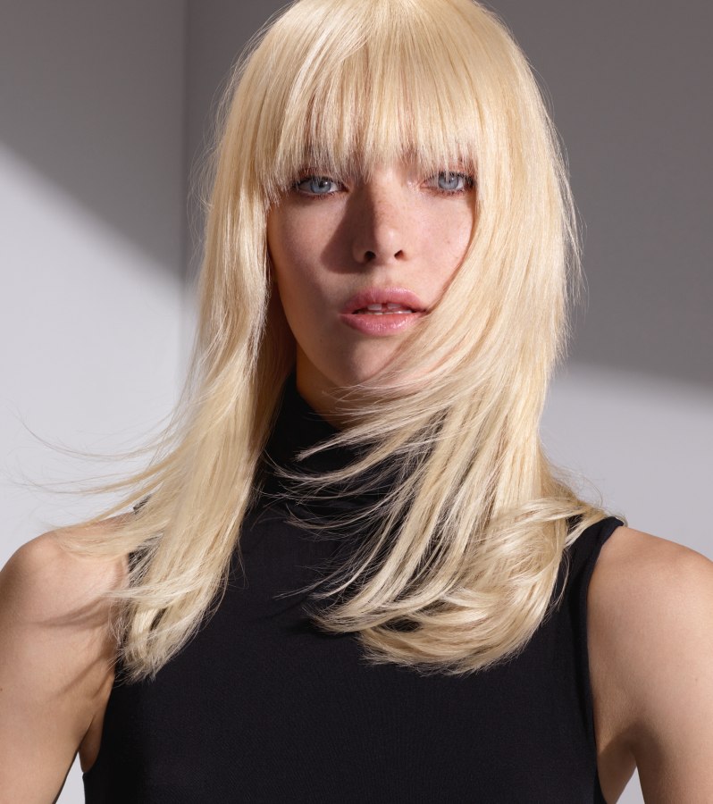 Sophisticated Long Blonde Hair With Full Bangs Sophisticated Long Blonde Hair With Full Bangs