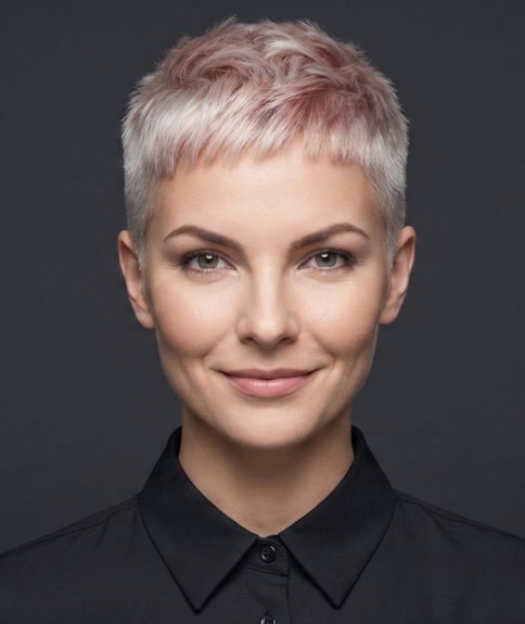 Ultra-short blonde hair with rose accent colors