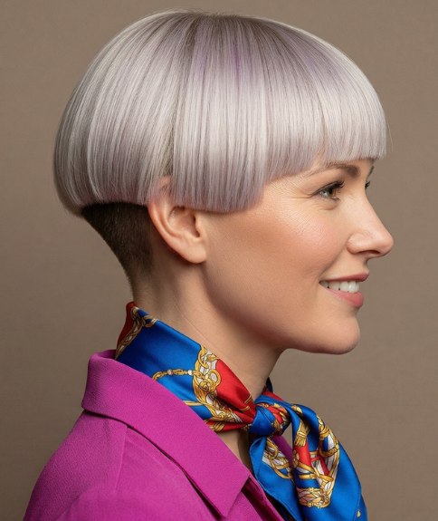 Bowl cut with a fringe and pastel hair color