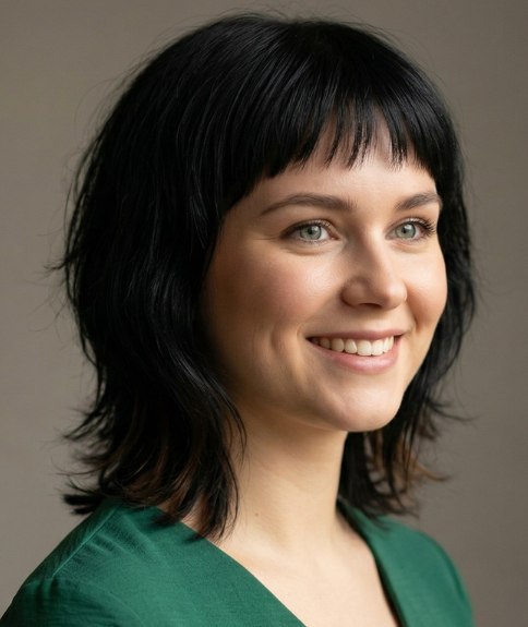 Choppy shag haircut with a short fringe