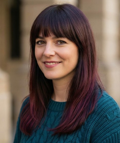 Long, straight hairstyle with a fringe