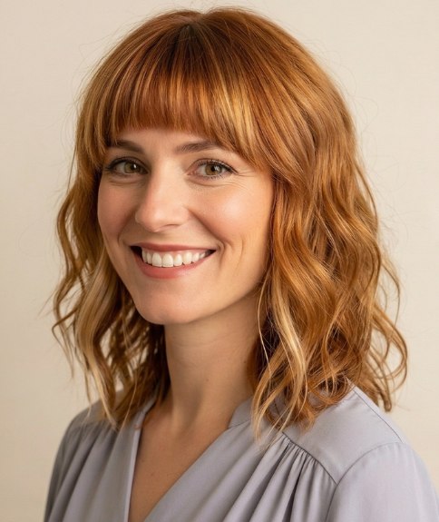 Just below the shoulders hair with a fringe