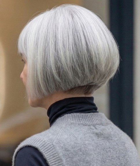 Gray hair in a bob that was cut shorter at the back