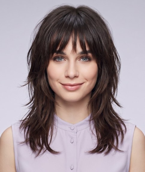 Below the shoulders shag cut with bangs