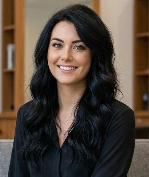 Long, blue-black hair with loose waves