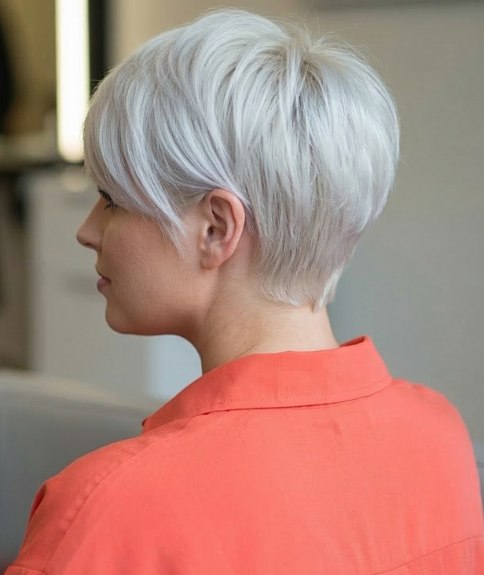 Romantic pixie cut with a long fringe
