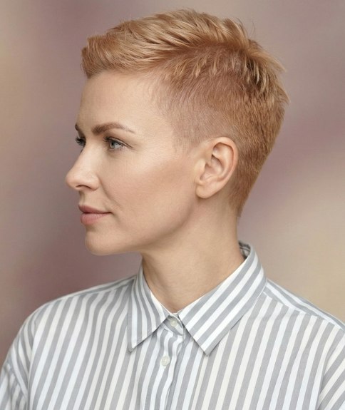 Women's haircut with buzzed sides and back