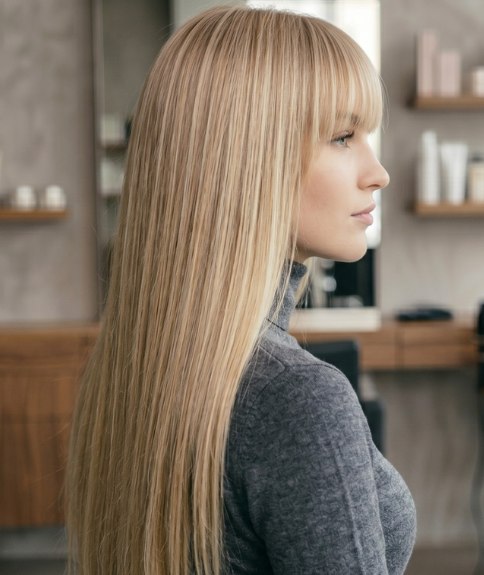 Very long blonde hair with a fringe