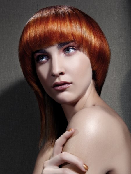 Glossy copper hair in a tapered cut