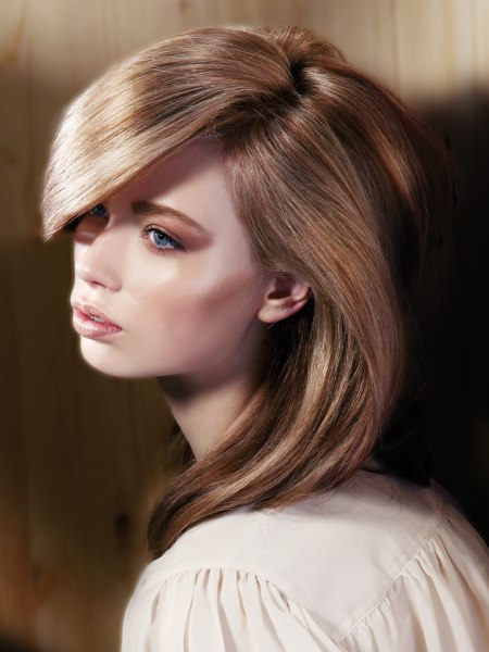 Side view of shoulder length hairstyle with a lot of swing