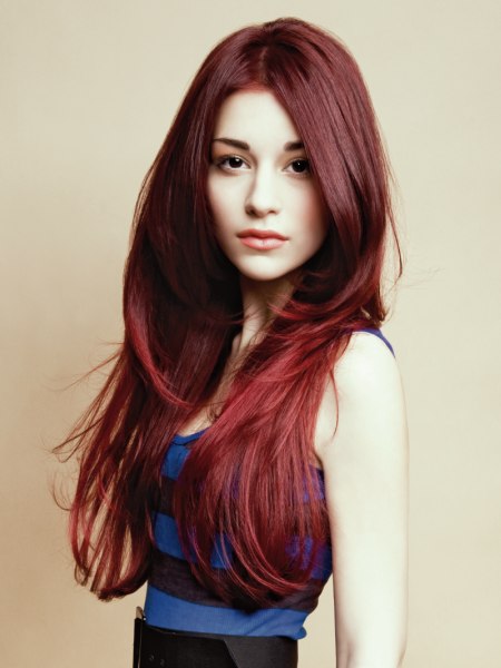 Very long dark red hair with layers