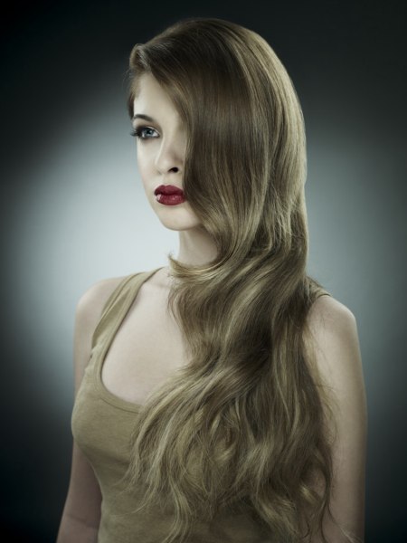 Waist length hair styled to one side