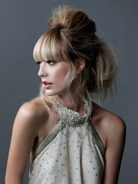 Modern upstyle with bangs and 60s influences