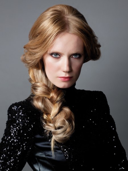Hair styled in a long, irregular braid