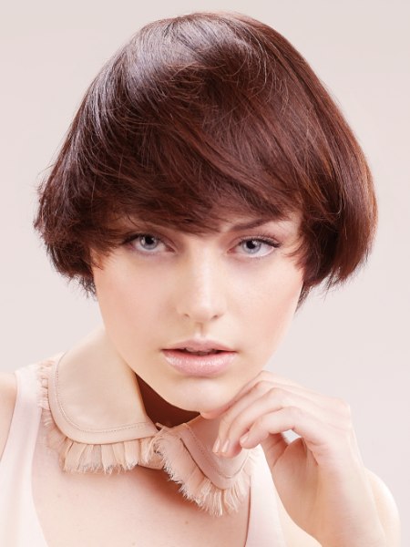 Short round bob with texture for warm brown hair